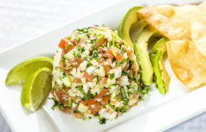 Ceviche on a plate with avocado