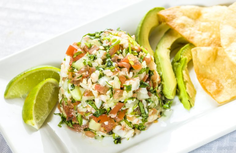 Ceviche on a plate with avocado